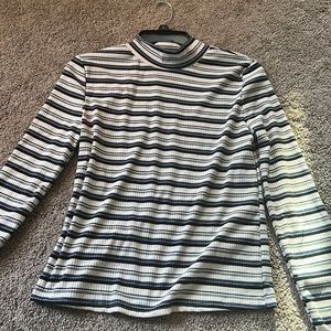 cute turtle neck, never been worn. fall or spring kind of shirt